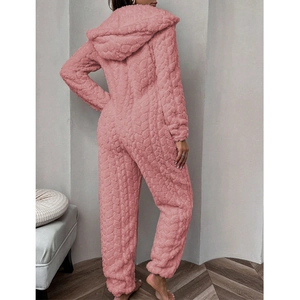Pink hooded coral fleece onesie for women featuring heart embossed texture and elastic cuffs