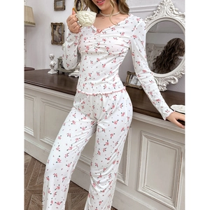Floral rib-knit long sleeve pajama set for women featuring V-neckline with pink bow detail