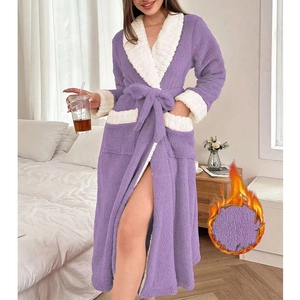 Detail view of purple coral fleece robe showing soft white plush collar and warm texture