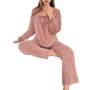 Women's pink coral fleece pajama set featuring square neck top with bow and matching pants