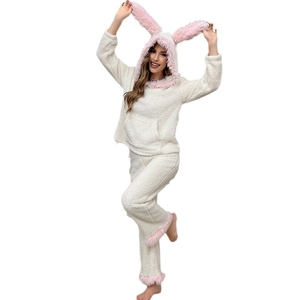 Women's white coral fleece pajama set with pink bunny ears and hooded kangaroo pocket