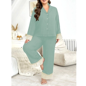 Detail of sage green pajama set with white ruffle lace trim on cuffs and trouser hems