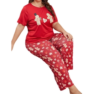 Pigiama donna taglie forti con stampe di pan di zenzero in colore rosso natalizio