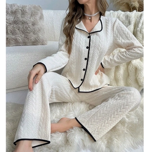 Quilted warm pajamas set for women featuring contrast black piping and button-down cardigan