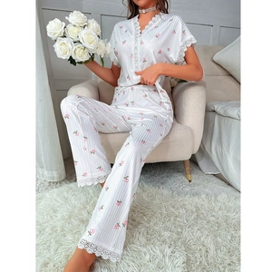 Women's floral V-neck pajama set with white lace trim and silky texture for loungewear