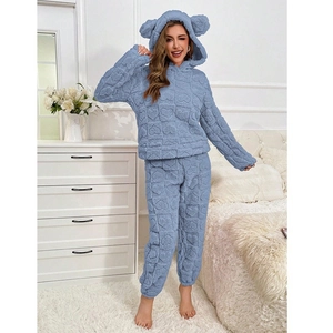 Detail of blue coral fleece hoodie with heart embossed texture and cute ear decorations