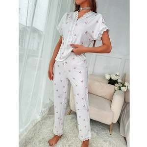 Women's V-neck floral pajama set with white lace trim and pink roses on striped fabric
