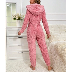 Plush pink hooded jumpsuit for women featuring embossed rabbit patterns for winter lounge wear