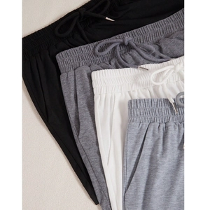 Women's casual lounge shorts featuring an elastic drawstring waist in neutral color tones