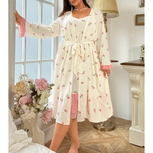 Two-piece floral loungewear set featuring a belted robe and a tiered ruffled nightgown