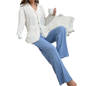 Women's two-piece pajama set with long sleeve button shirt and wide-leg seersucker pants