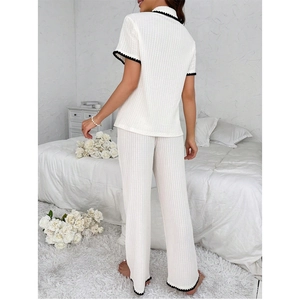 Women stripe knit pajama set with short sleeve lapel top and wide leg pants in white