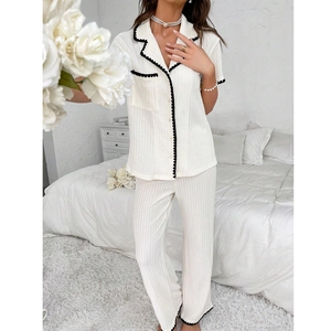 Women's cream rib-knit pajama set with lapel cardigan and wave-edged black trim