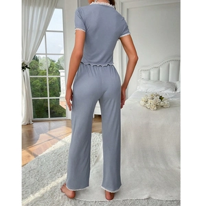 Light blue loungewear set with white lace trim and vertical ribbed texture back view