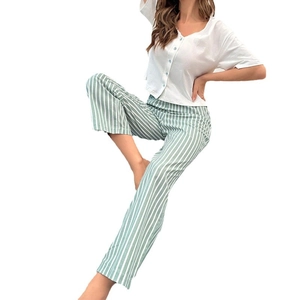 Women's V-neck pajama set with short sleeve top and green striped pants in soft cotton