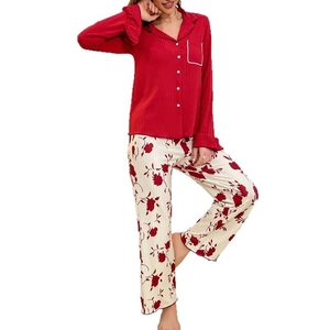 Women's two-piece floral pajama set with red ribbed cardigan and long floral pants