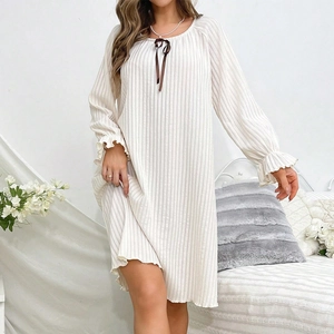 Sweet cream white ribbed long sleeve nightdress with a dark brown silk bow and ruffled cuffs
