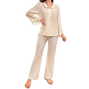 Women beige ribbed pajama set featuring button-up lapel top with flare ruffle sleeves
