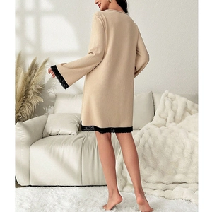 Elegant beige ribbed knit nightdress with delicate black lace trim for women home wear