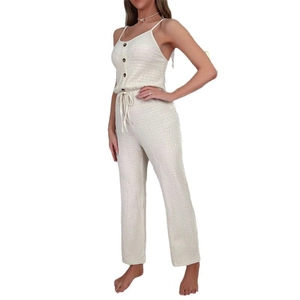Minimalist beige V-neck jumpsuit in breathable crinkle cotton fabric for women lounging