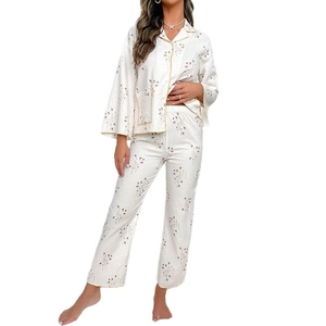 Women floral quilted pajama set with long sleeve button down top and trousers in white