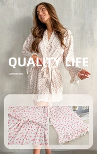 Detail of floral knit robe featuring ruffled cuffs and delicate rib-knit texture