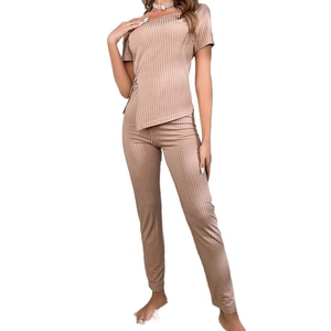 Women's rib-knit pajama set featuring an asymmetrical short-sleeve top and straight trousers