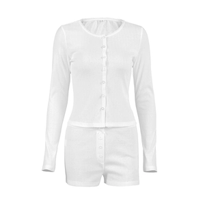 White jacquard knit two-piece pajama set with long sleeve button-up top and matching shorts