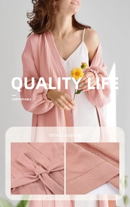 Detail of pink double gauze cotton robe featuring lantern sleeves and breathable texture