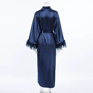 Detail view of smooth blue satin robe with luxury feather trim on wide sleeves