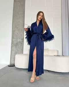 Detail of luxury satin sleepwear with feather cuffs and waist tie in dark blue silk