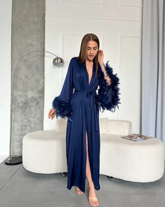 Detailed view of luxury navy satin robe featuring decorative feather cuffs and silk finish