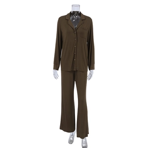 Detail view of coffee brown modal pajama set featuring button-up lapel top and wide-leg pants