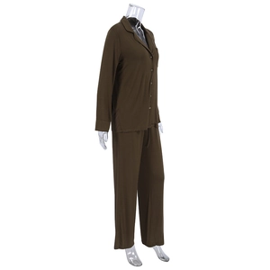 Detail view of dark brown modal pajama set with button-down long sleeves and trousers