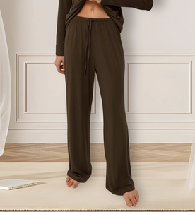 Detail of soft modal olive green wide-leg lounge pants with comfortable drawstring waist