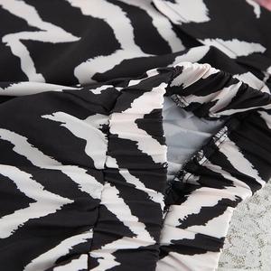 Close-up of zebra print pajama waistband showing elastic detail and quality stitching