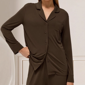 Women's modal long sleeve pajama set in deep brown featuring button-up top and matching pants