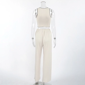 Detail view of the apricot loungewear set featuring elastic waistband and contrast trim