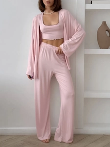 Detail of soft apricot loungewear 3-piece set showing texture and drape of the fabric