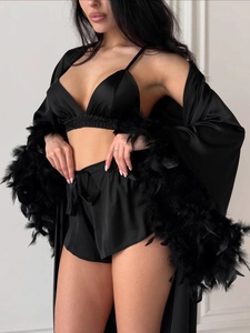 Detail of silk-like satin robe with premium feather trim and lace-up matching shorts