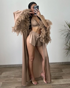 Detailed view of coffee satin loungewear with luxury feather trim on the sleeves