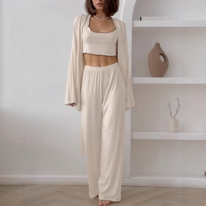 Three-piece apricot milk silk sleepwear set with tank top, pants, and cardigan