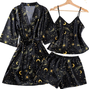 Women's 3-piece satin pajama set with moon and star print including robe, top and shorts