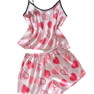Women's two-piece pink heart print satin pajamas set with camisole and shorts