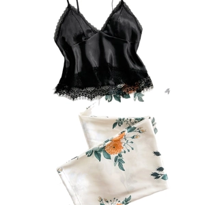 Women's satin camisole set with lace trim and floral print trousers for home wear