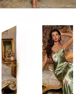 Detail of elegant dark green silk pajama dress with white floral pattern and V-neckline