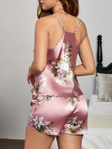 Detailed back view of pink floral satin camisole and shorts pajama set for women