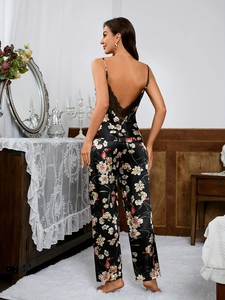 Detail of floral satin pajama set with backless lace stitching and V-neck tank top