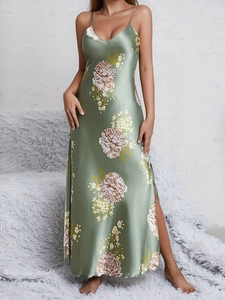 Detail of dark green floral silk nightgown featuring V-neckline and side slit