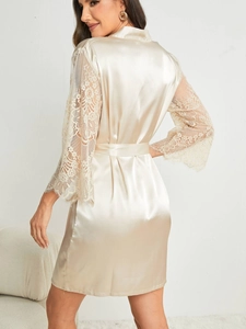 Detail of champagne satin robe showing lace拼接 cuffs and elegant silk back view